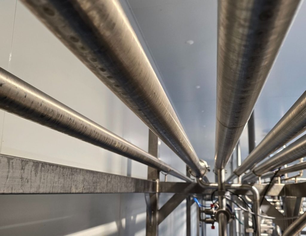 Advanced stainless steel piping network engineered for reliable fluid transfer systems