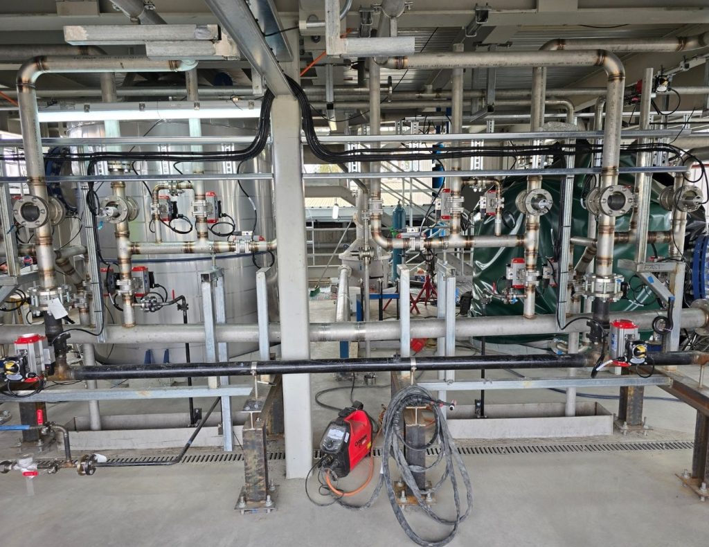 Custom condensate return piping system engineered for energy efficiency in food manufacturing plants