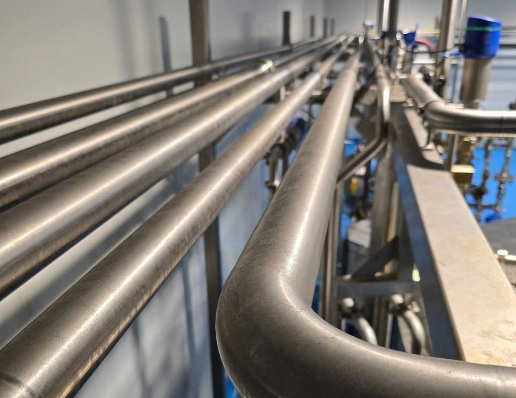 Custom stainless steel product line piping designed for water treatment facilities