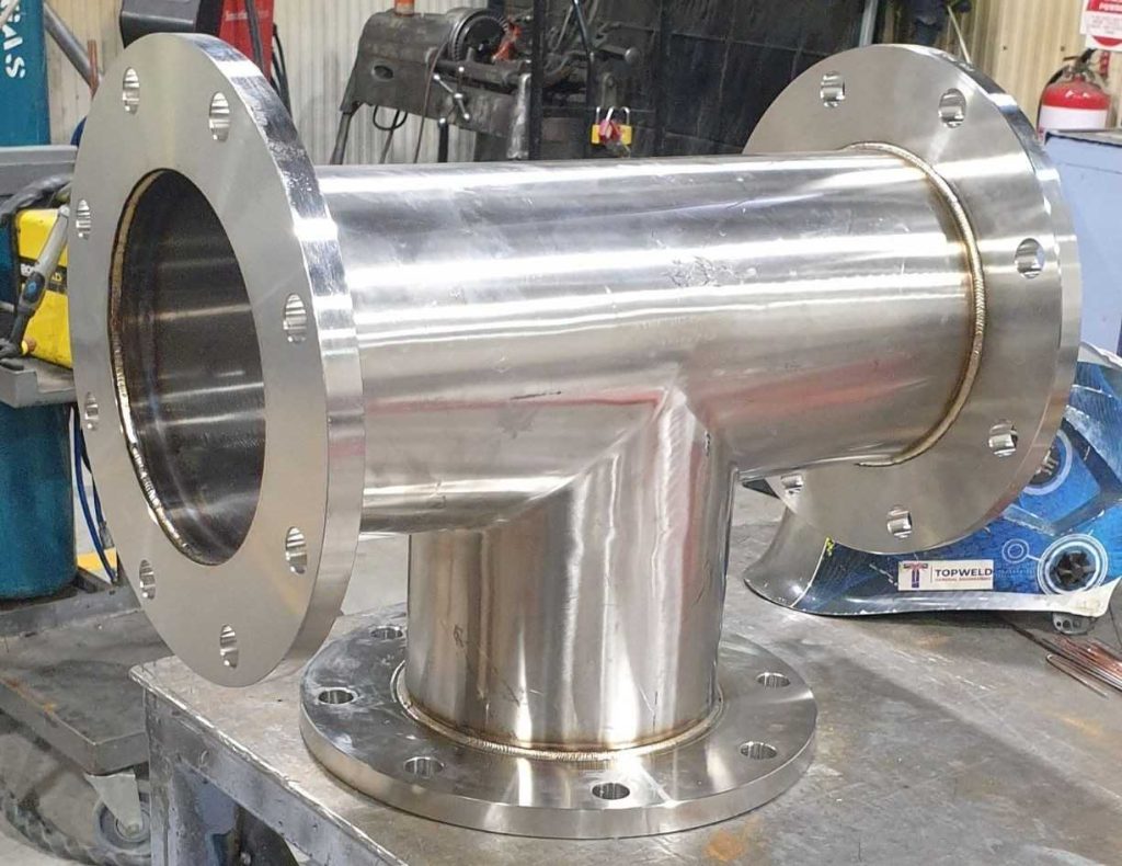Stainless steel pipeline tee fabricated for industrial fluid and process systems