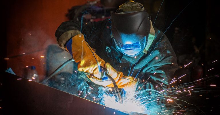 Custom metal fabrication for abattoir overhead rail systems with hooks and hangers