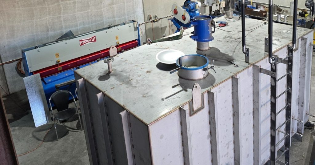 A stainless steel tank from a brewery company being repaired in Topweld shop